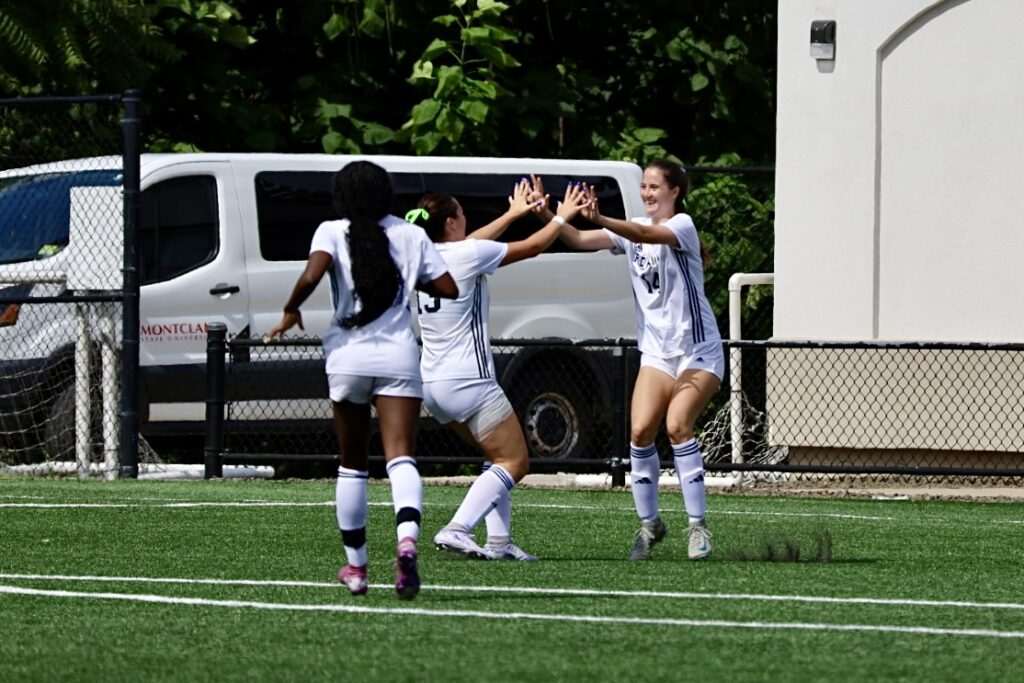 Montclair State women's soccer celebrates in the midst of a 7-0 rout of Manhattanville University on September 12. Abby Brown | The Montclarion
