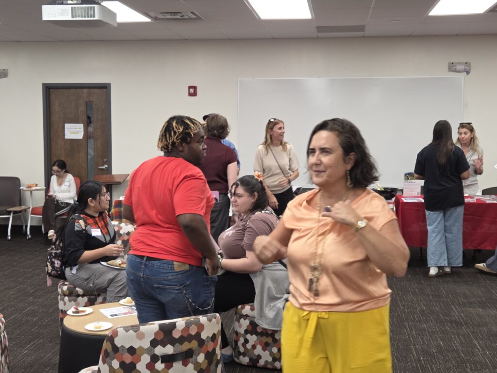 Visitors mingling during the Sept. 16 Global Cultural Studies Departnent Welcome Fest