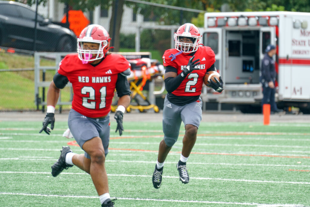 Sophomore safety Jahmir Beal runs back an interception against Christopher Newport. Beal ended the game with two takeaways, winning conference defensive player of the week. Jamiel Negron | The Montclarion