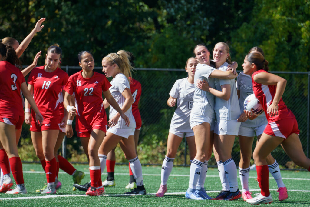 Women's Soccer players celebrate after scoring against Rutgers-Newark, Saturday, Oct. 3, 2026.