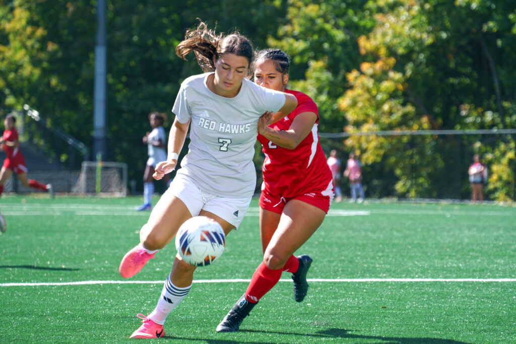 Carly Guzzardo maneuvers around a defender during the homecoming game, Saturday, Oct. 3, 2026.